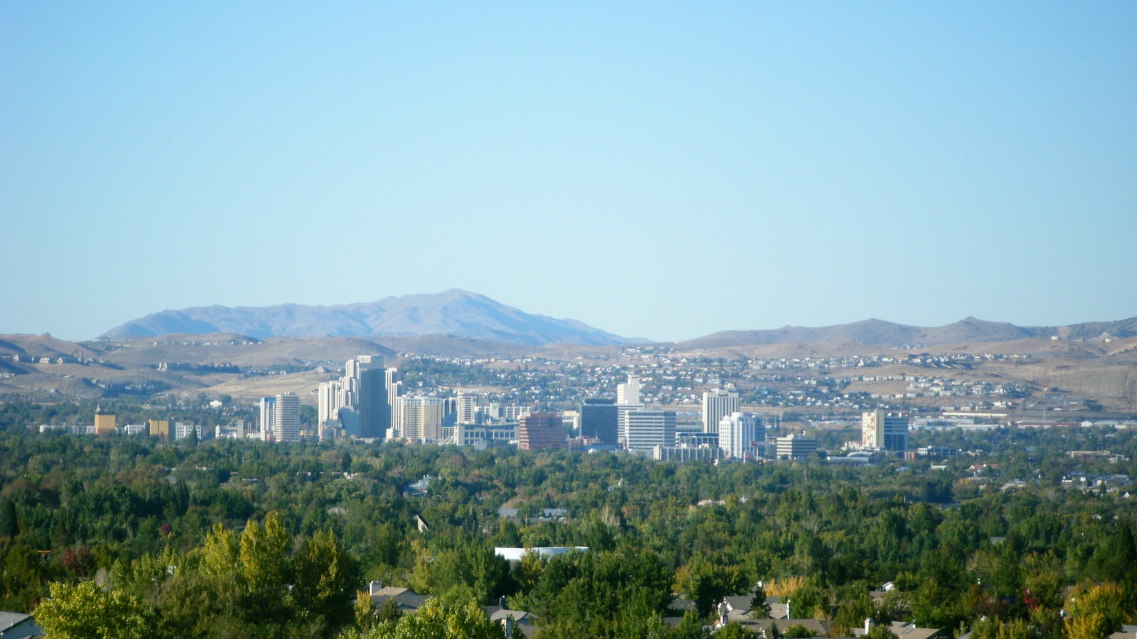 Downtown Reno skyline beneath the Sierra Nevada