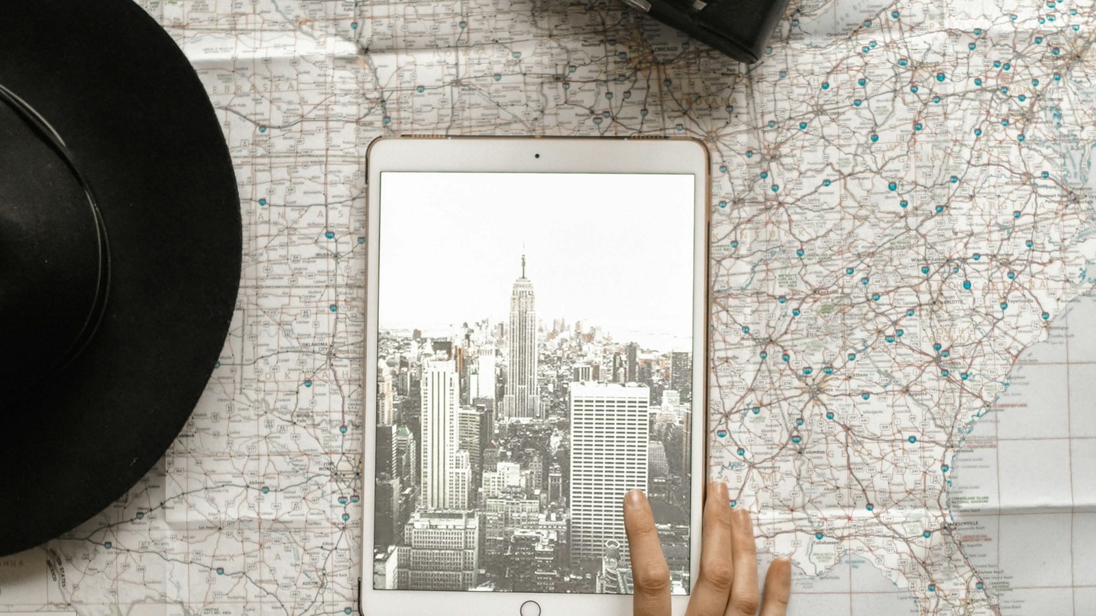 A map and travel equipment arranged for researching a trip
