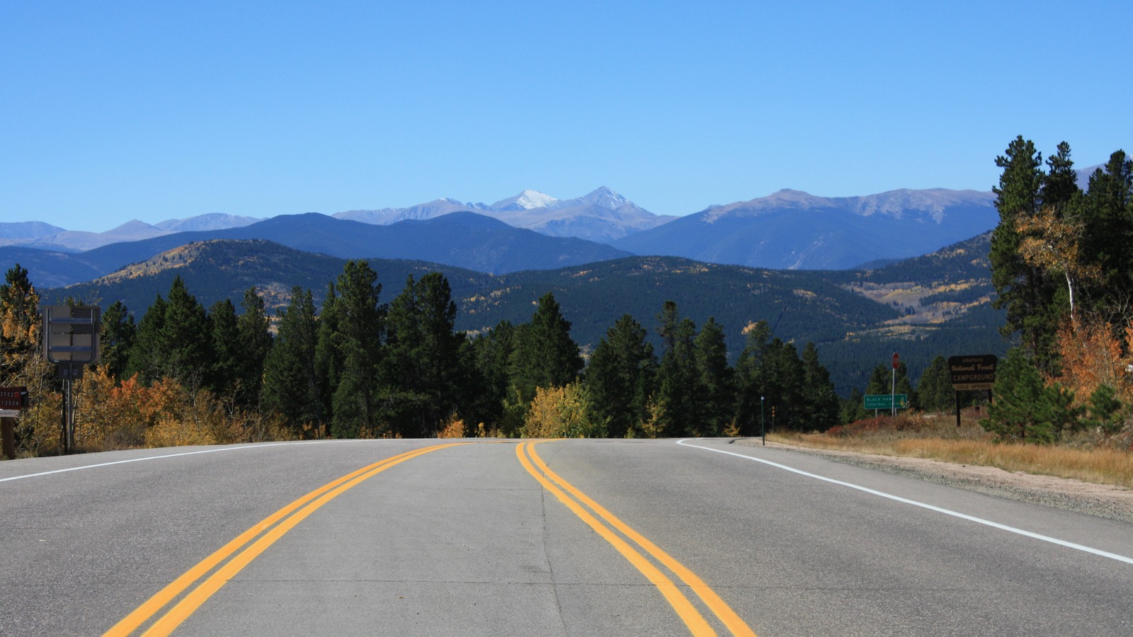 Peak to Peak Scenic Byway curves toward the Continental Divide at the SH 46 junction in Colorado