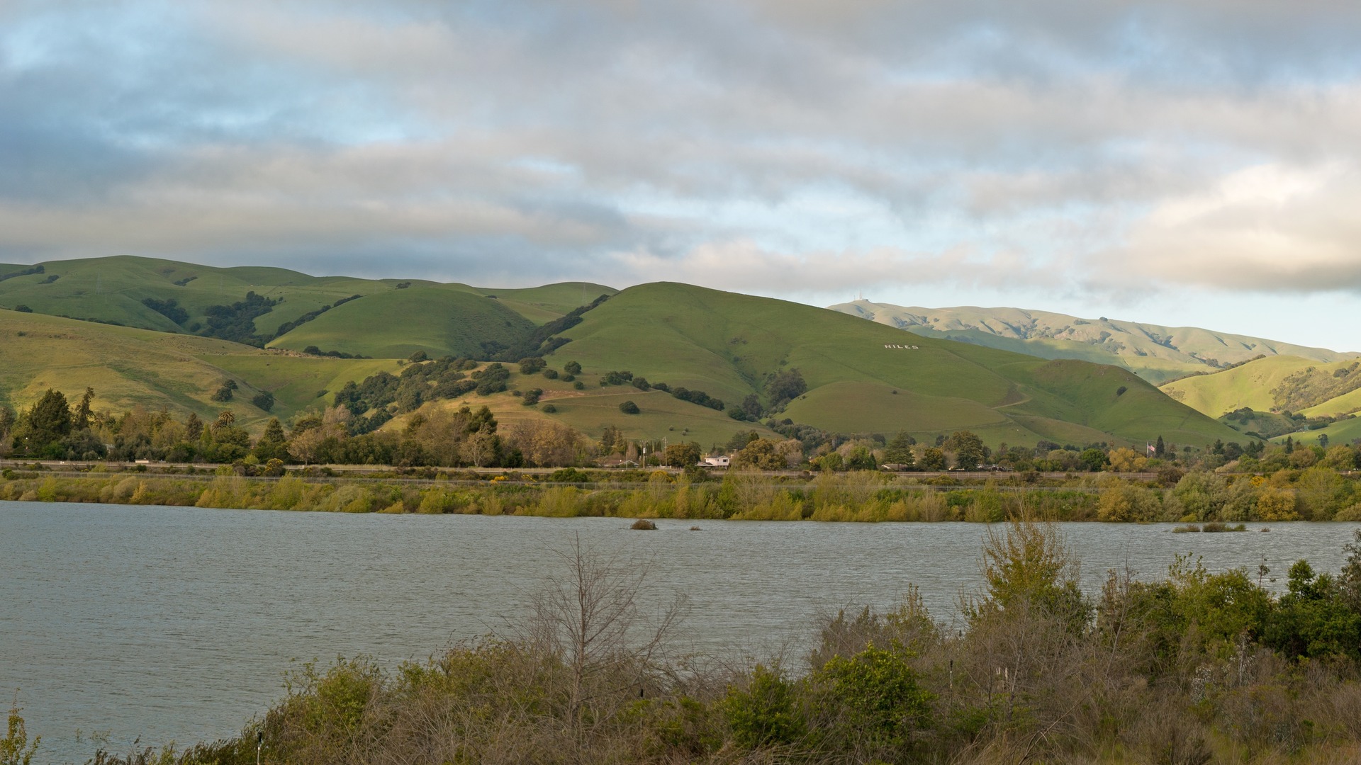 Open water at Quarry Lakes Regional Recreation Area in Fremont, California, with the hills behind