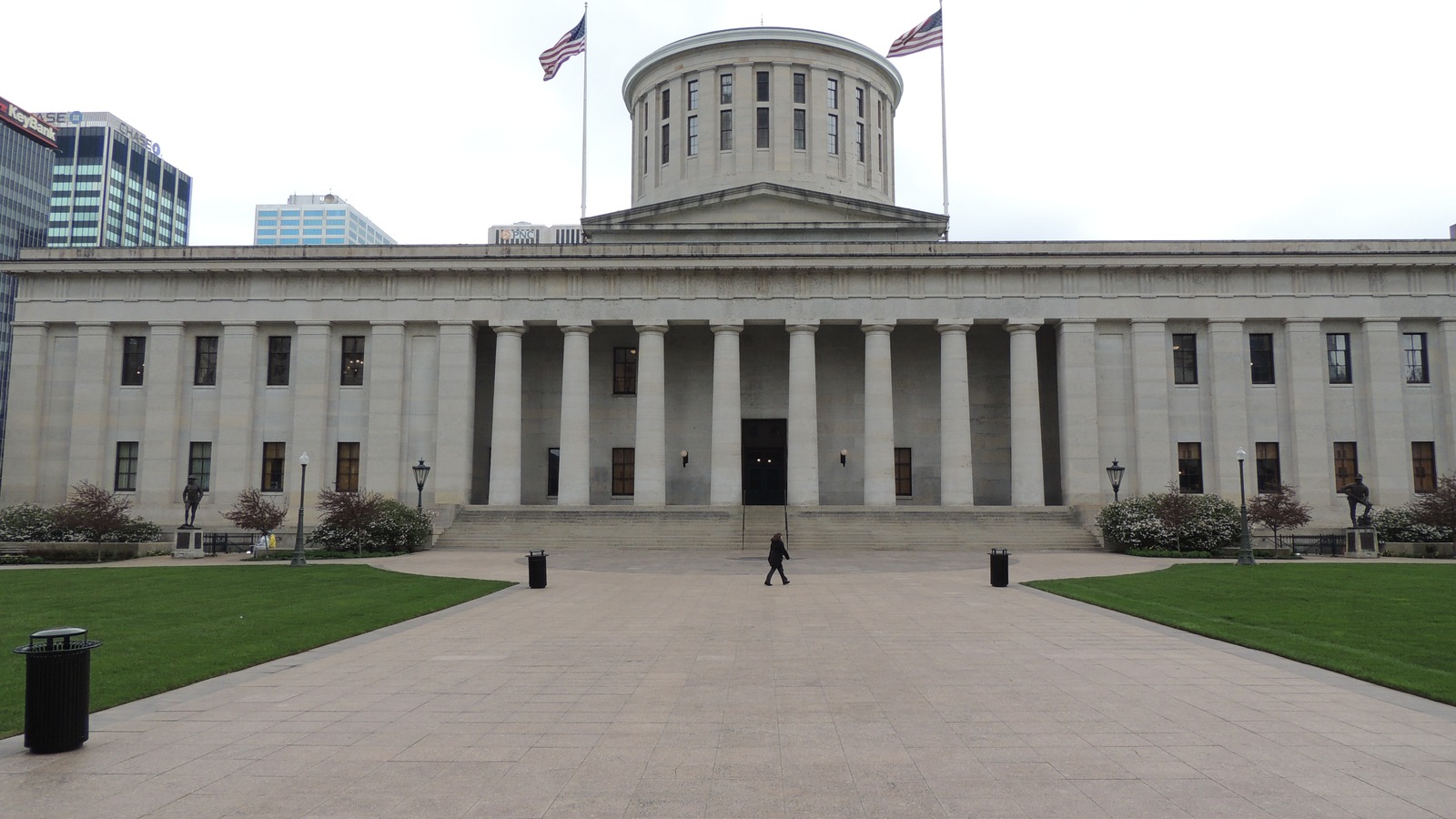 The Greek Revival limestone front of the Ohio Statehouse in Columbus, with its columned portico and low cupola above Capitol Square