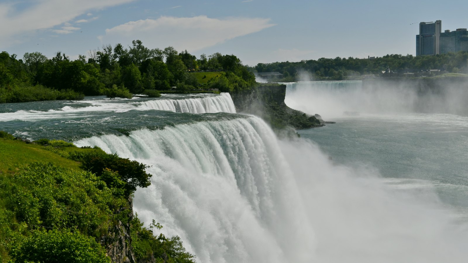 American Falls in the foreground with Horseshoe Falls beyond, seen from the United States side at Niagara Falls