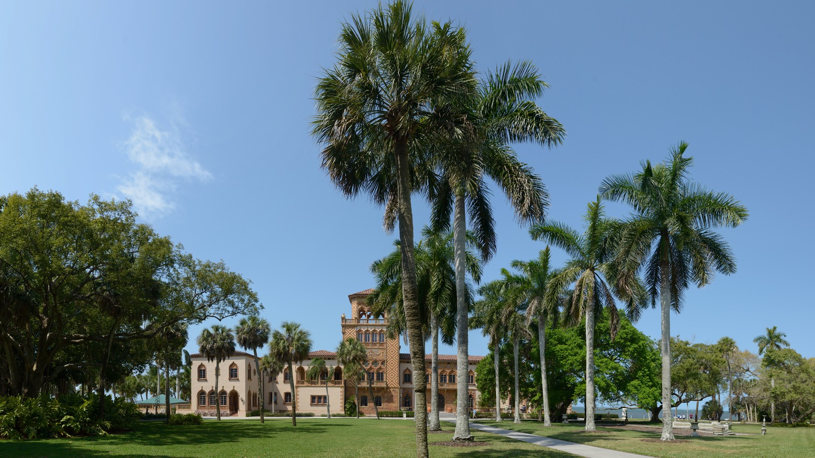 Ca' d'Zan mansion at The Ringling in Sarasota framed by palms and lawn