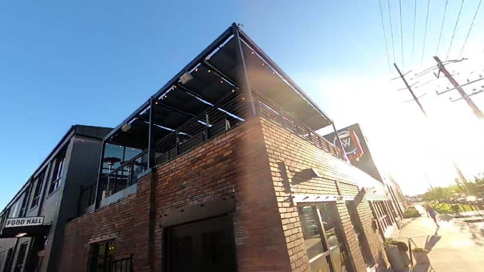 Woodbine Food Hall brick exterior and rooftop structure in Salt Lake City