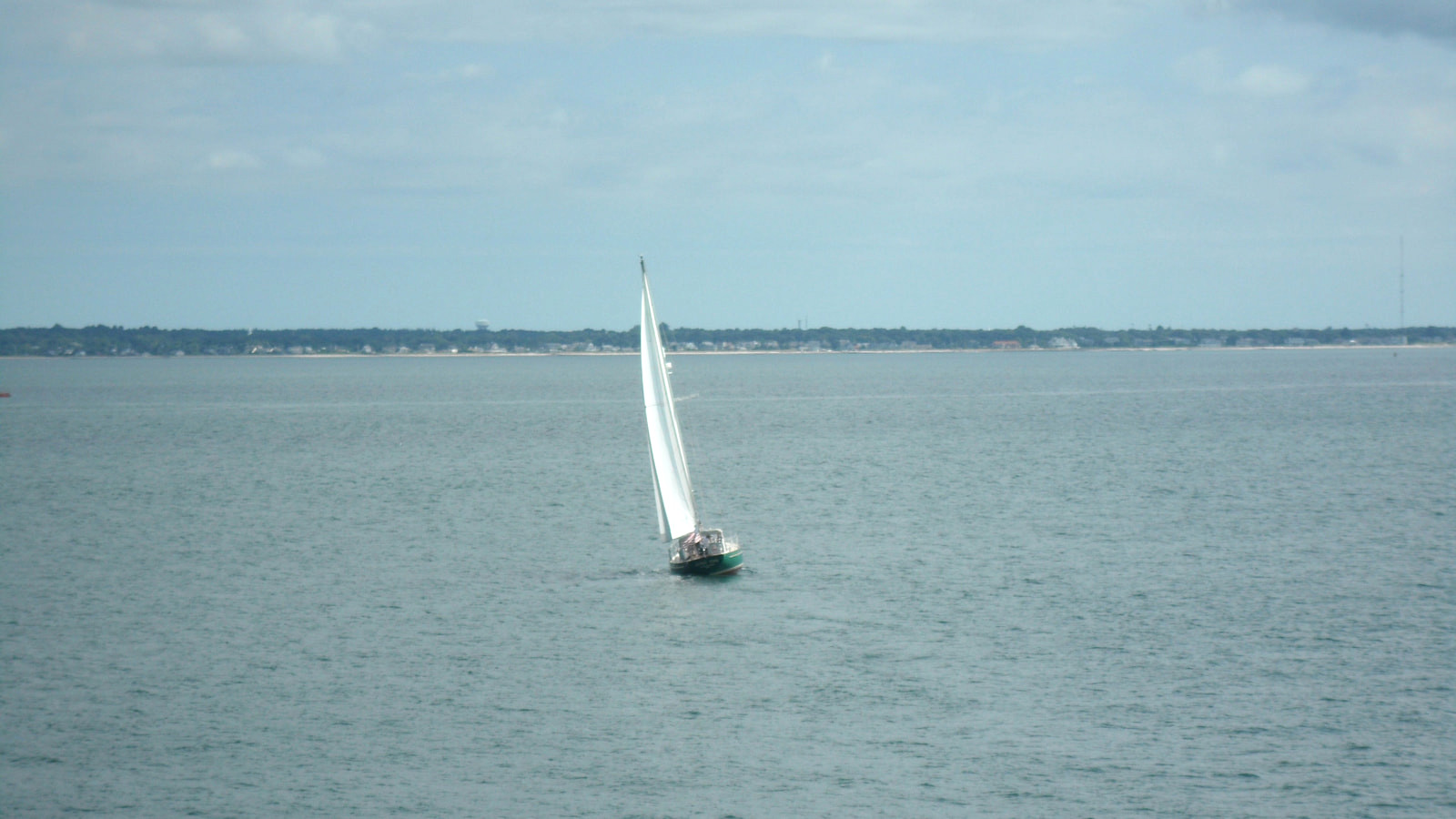 Sailboat crossing Vineyard Sound along the Steamship Authority ferry route