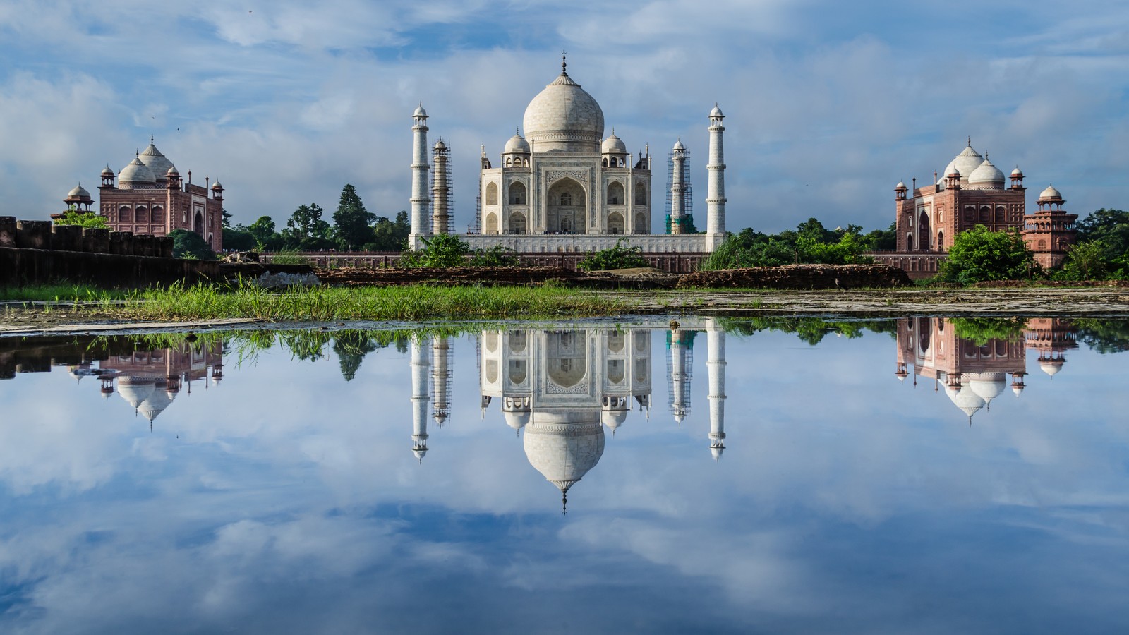 Taj Mahal reflected in the long central water feature in Agra, India