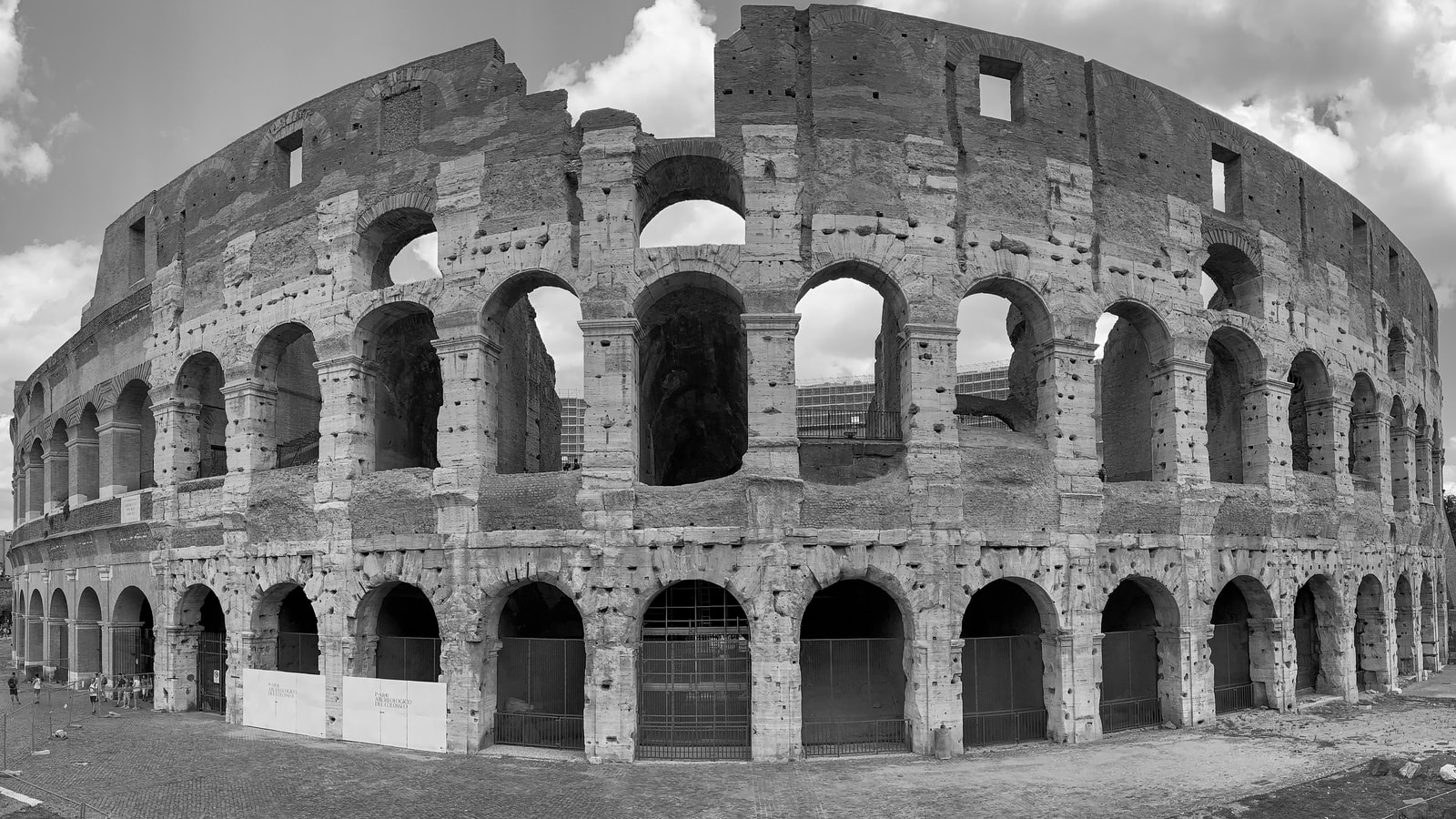 Colosseum exterior and arches in Rome