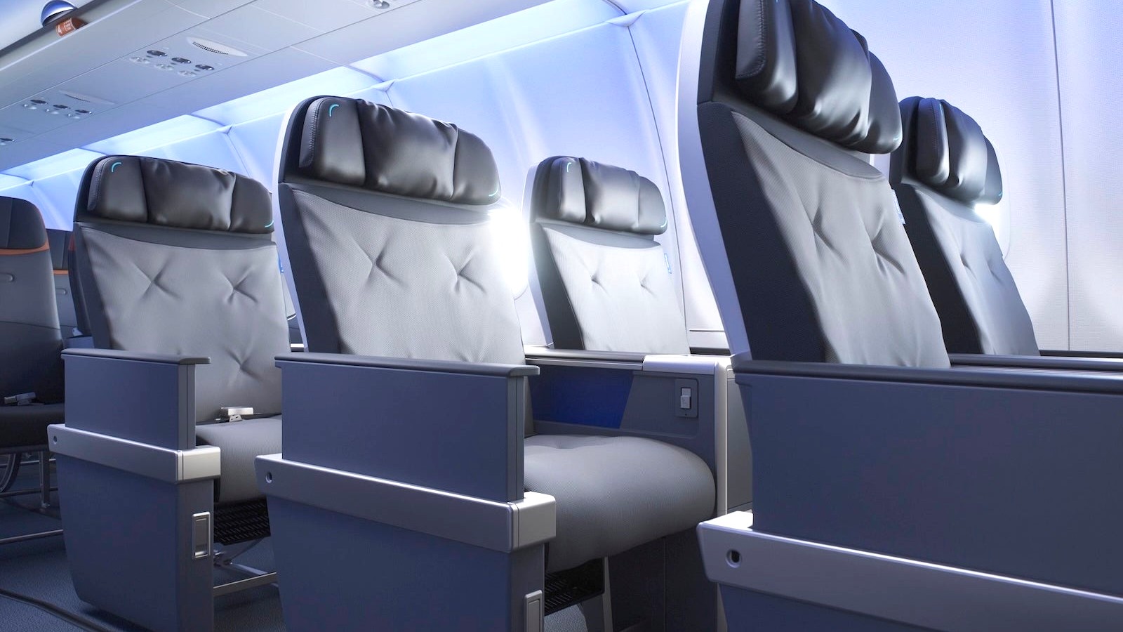 JetBlue BlueFirst 2-2 recliner cabin with gray seats and black headrests