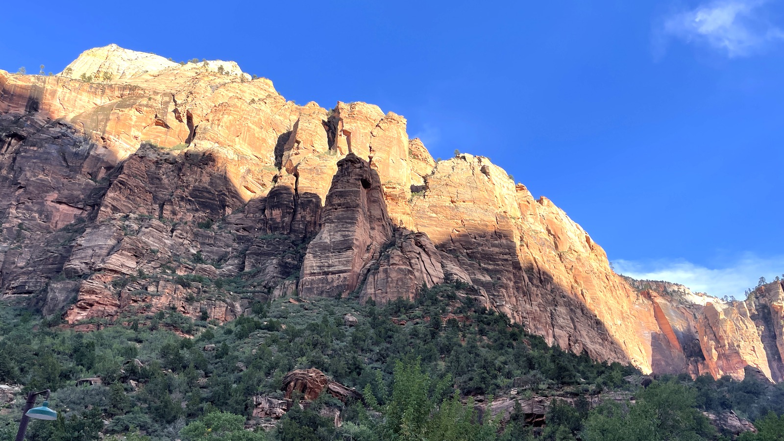 Sunlit sandstone walls above Zion Canyon Scenic Drive in Zion National Park