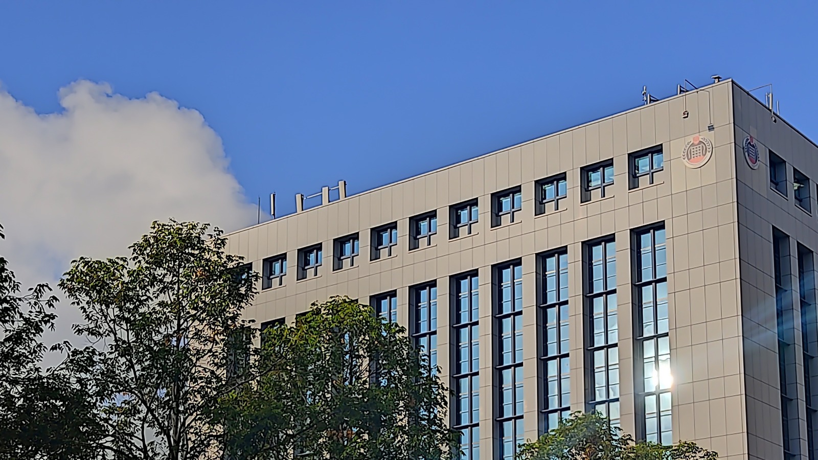 Exterior of the Immigration and Checkpoints Authority building in Singapore, photographed from the street.