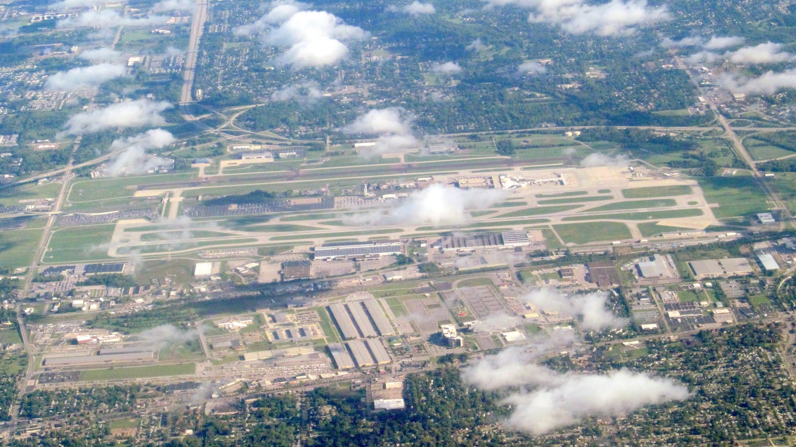 Aerial view of terminal, parking roads and runways at John Glenn Columbus International Airport