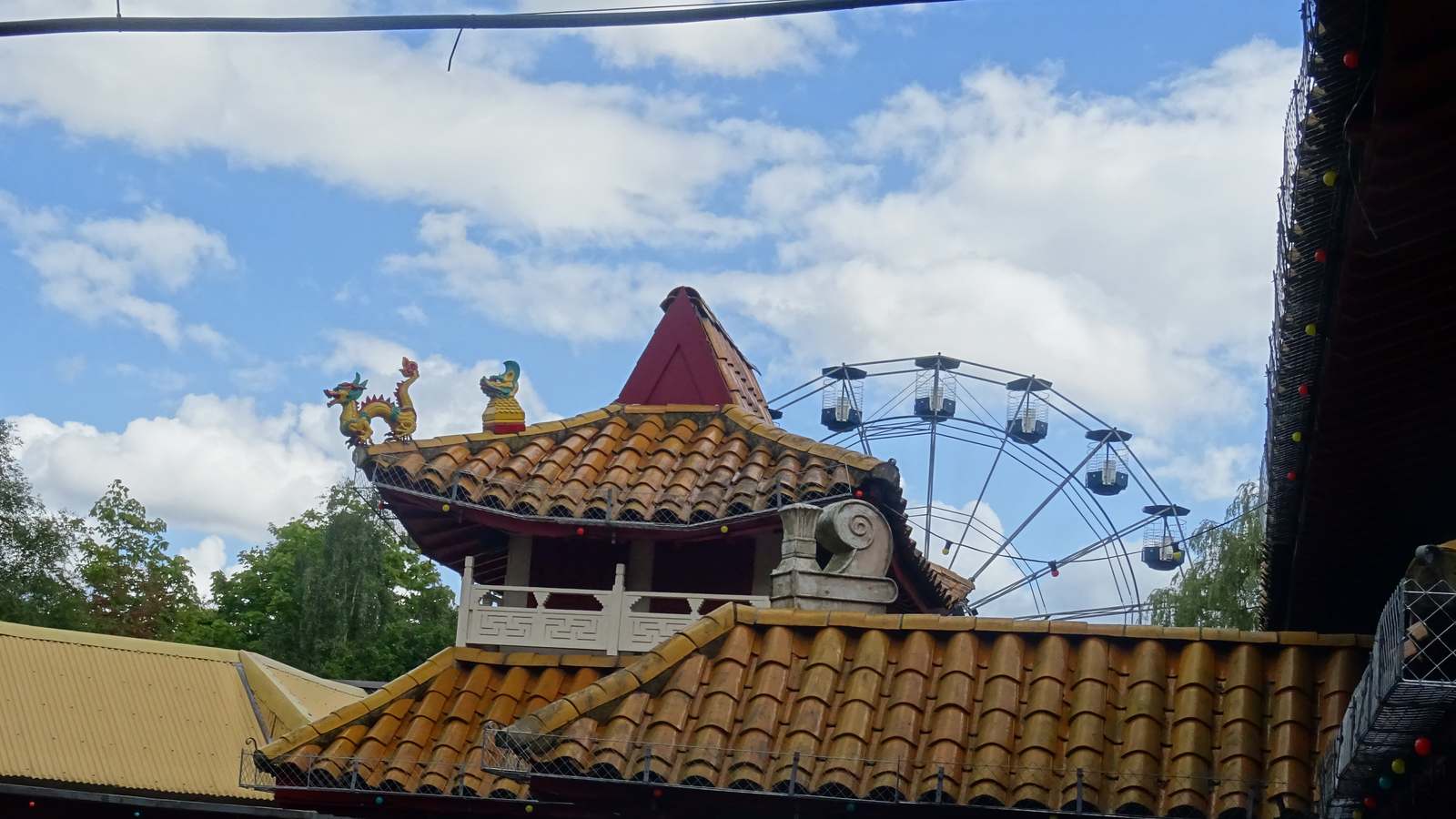 Pagoda style rooftops and a Ferris wheel at Chessington World of Adventures