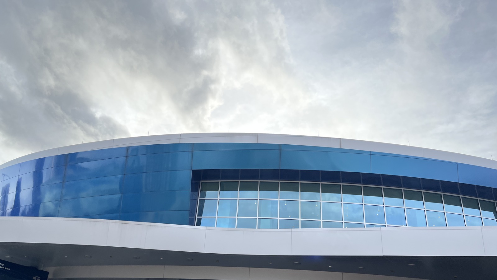 Blue and white Georgia Aquarium façade in Atlanta, photographed November24 2022 before the2026 Haunted Seas event.