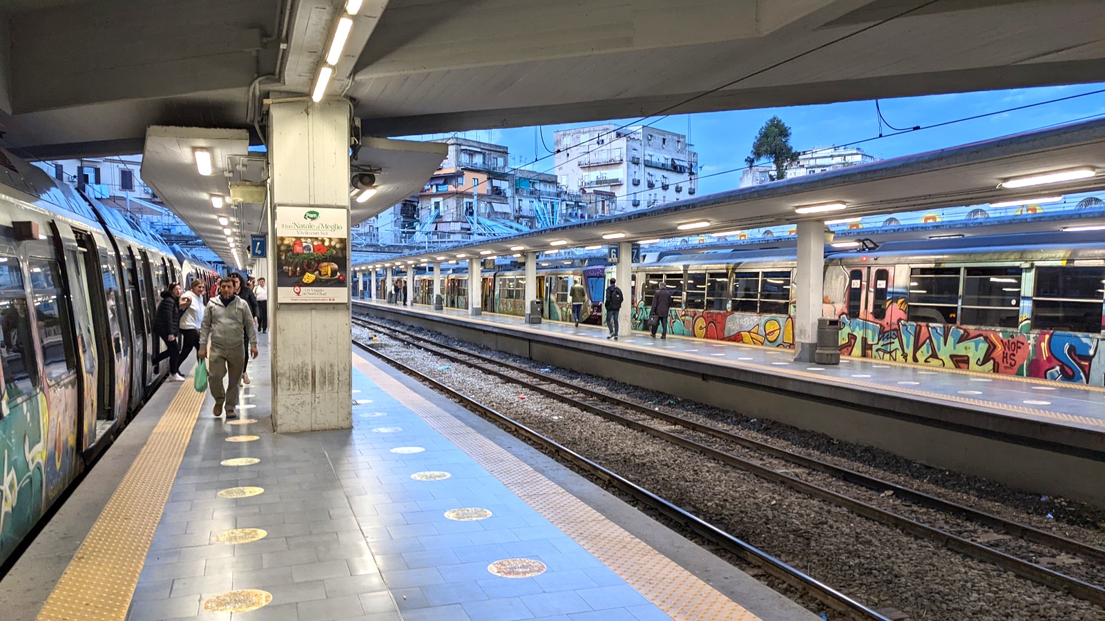 Platforms and ordinary trains at Napoli Porta Nolana, Naples, photographed April 21, 2023