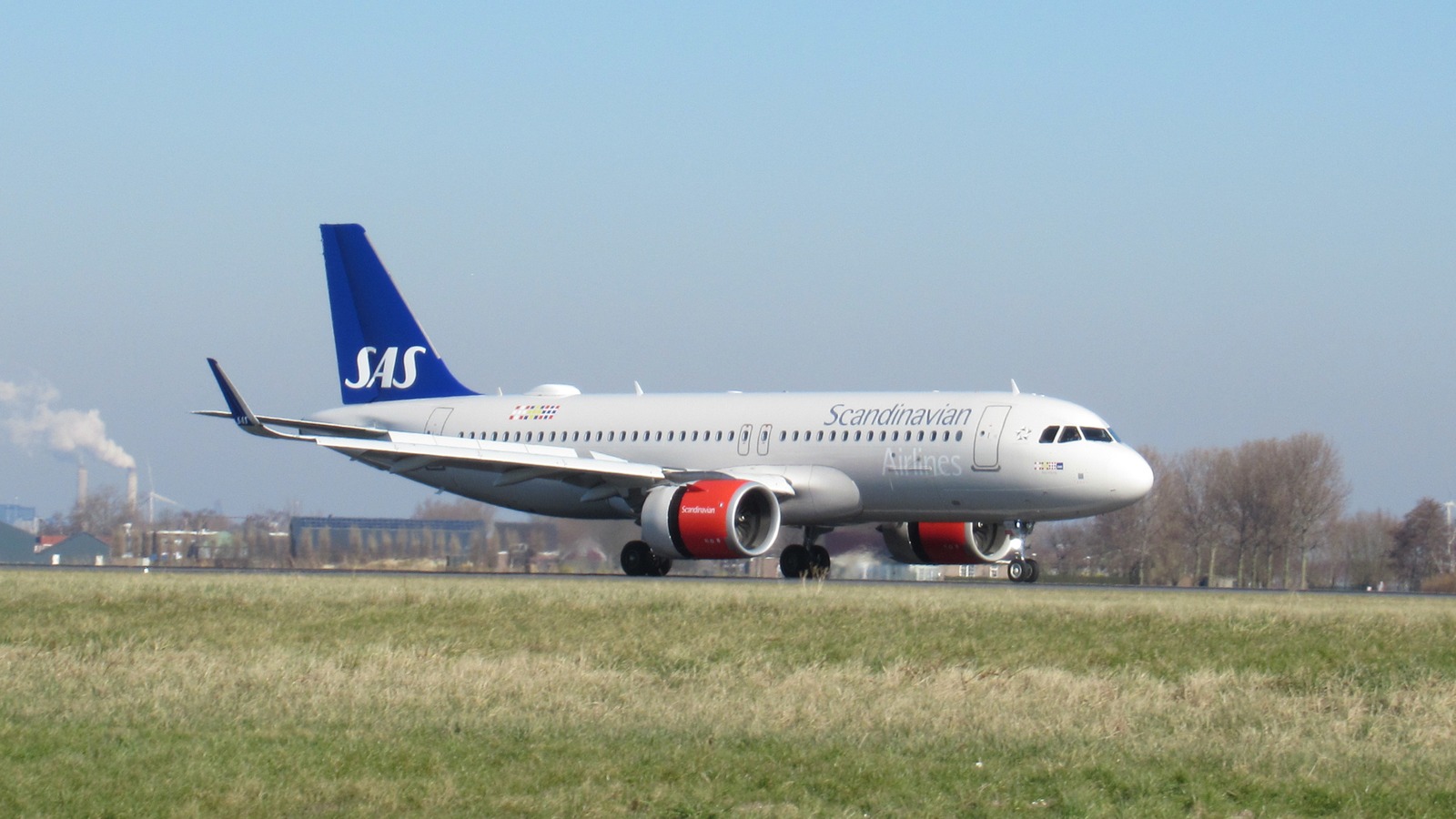 Scandinavian Airlines Airbus A320neo aircraft on a runway in daylight
