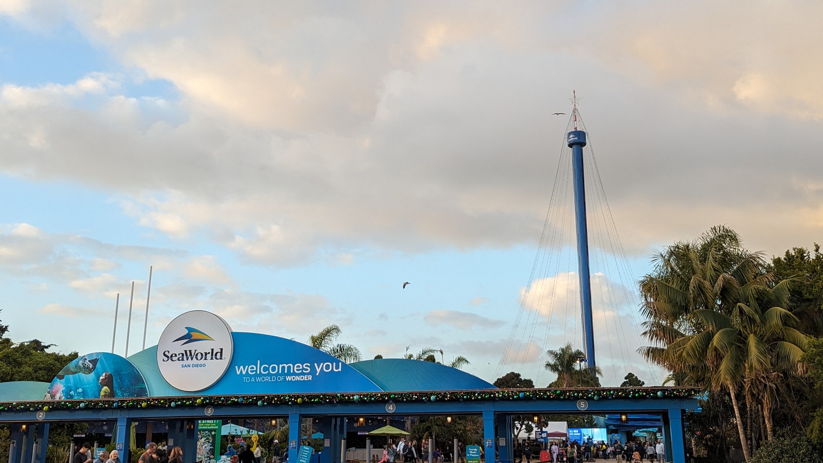 SeaWorld San Diego entrance sign and arrival plaza in November 2023