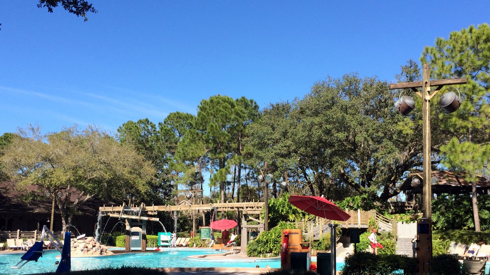 Ol Man Island feature pool at Disney Port Orleans Riverside in Orlando, with the waterslide, main pool, and hot tub