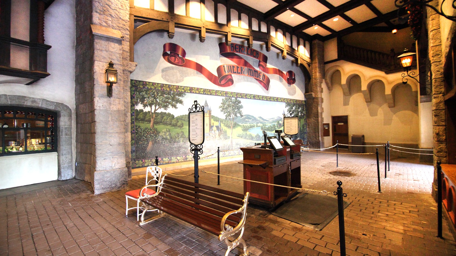 Host stand and welcome mural at Biergarten Restaurant in EPCOT World Showcase Germany Pavilion