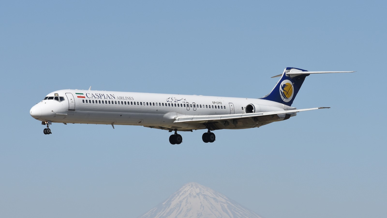 Caspian Airlines McDonnell Douglas MD-83 EP-CPZ on approach to Tehran Mehrabad International Airport with a snow-capped peak in the background