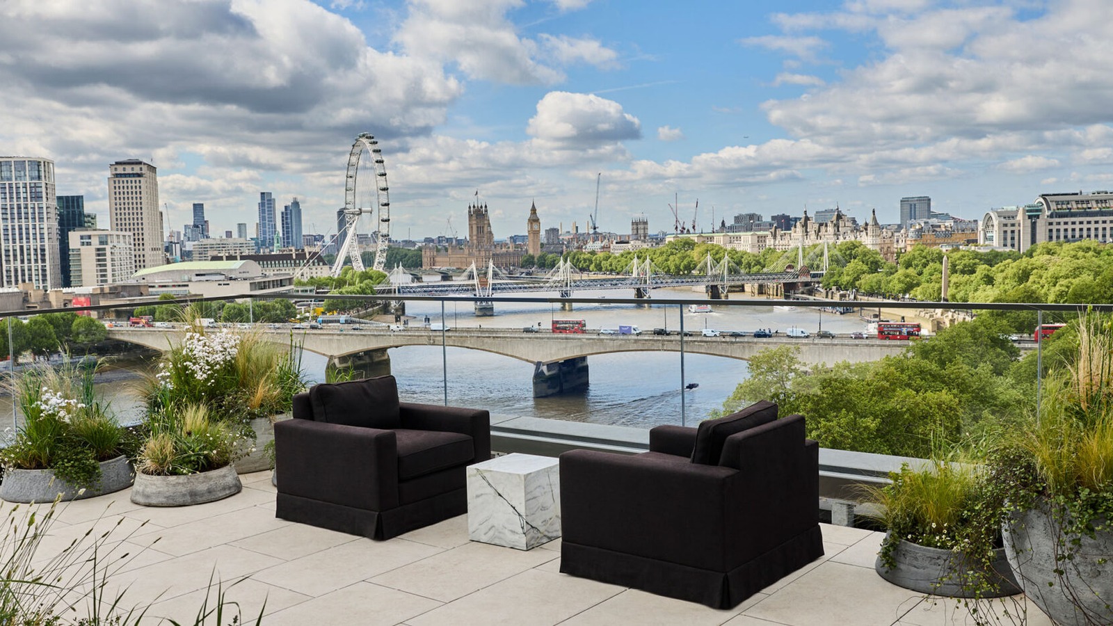 Terrace at St. Clement hotel overlooking the Thames, Waterloo Bridge, the London Eye and Parliament