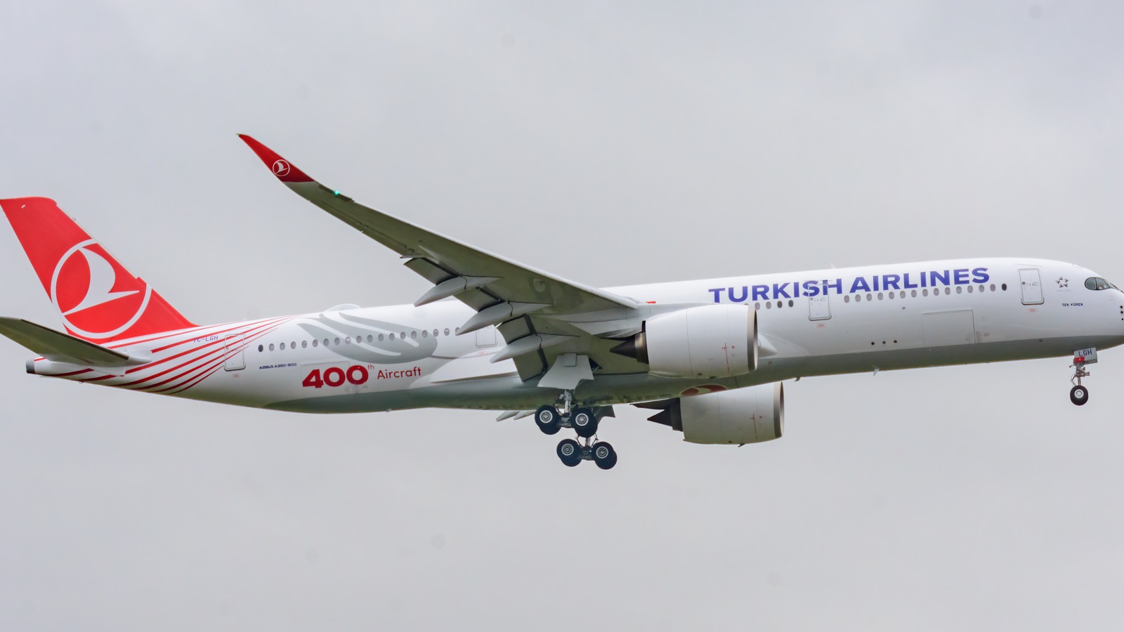A Turkish Airlines Airbus A350-900 in flight in standard livery markings with special 400th aircraft titles