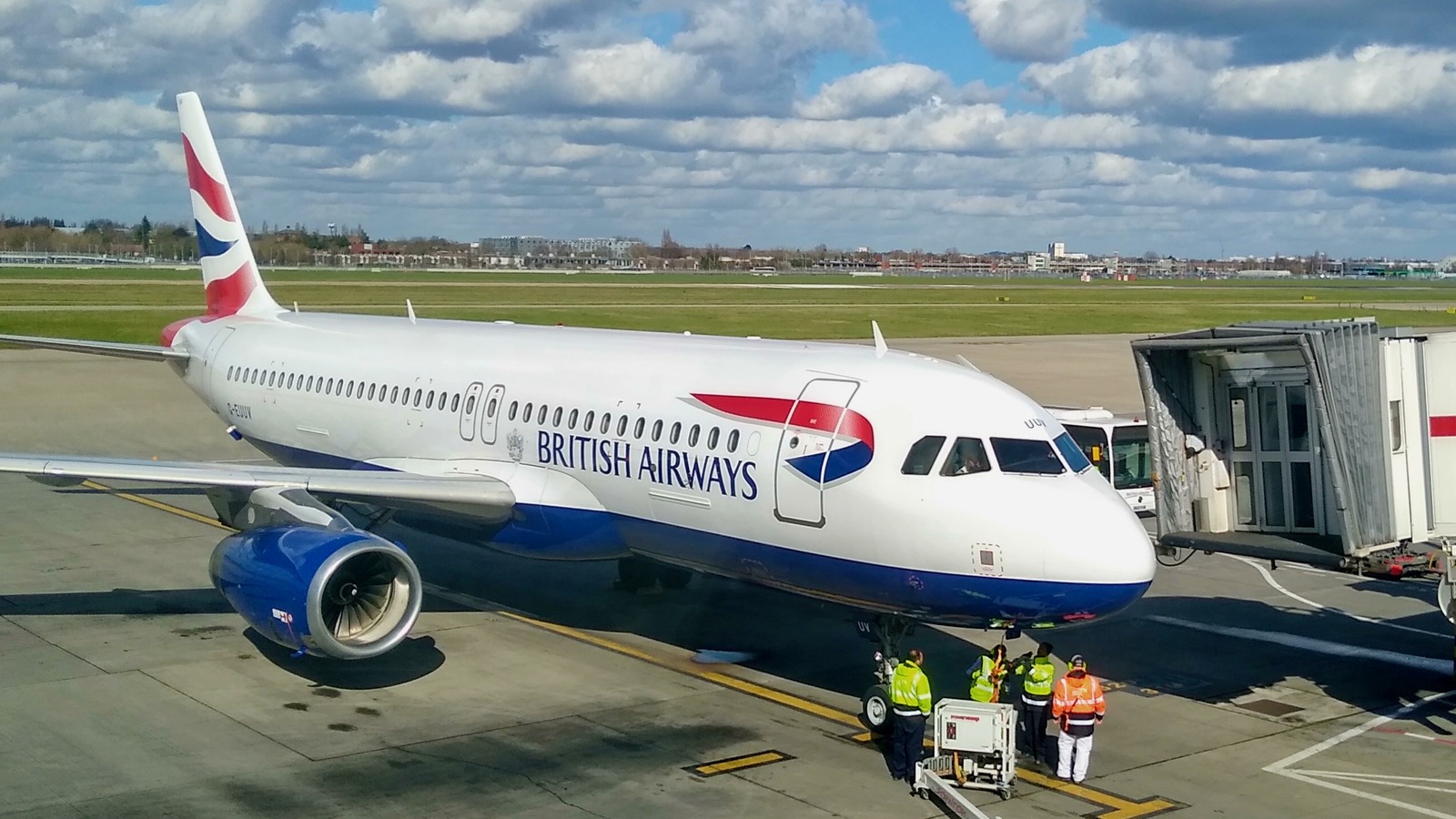 British Airways Airbus A320 on stand at London Heathrow Terminal 5 on a bright day