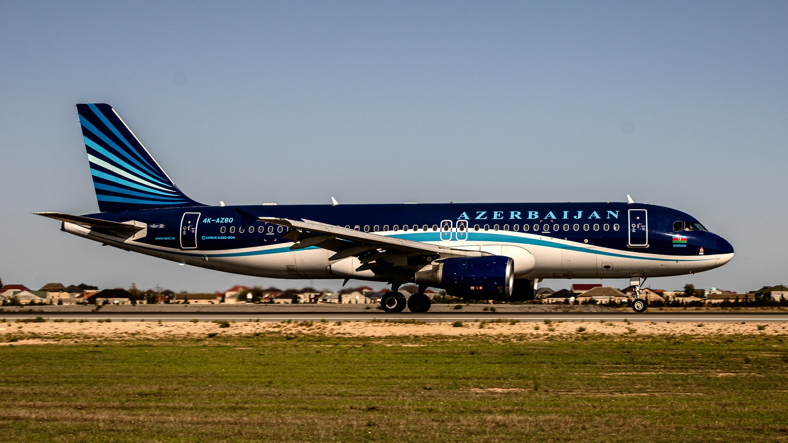 Azerbaijan Airlines Airbus A320 named Shirvan, registration 4K-AZ80, on a runway in the airline's current blue livery