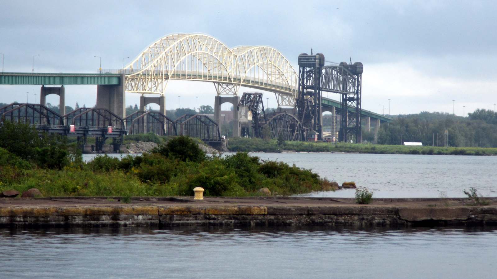 Sault Ste. Marie International Bridge arches over the St. Marys River seen from Canal Drive