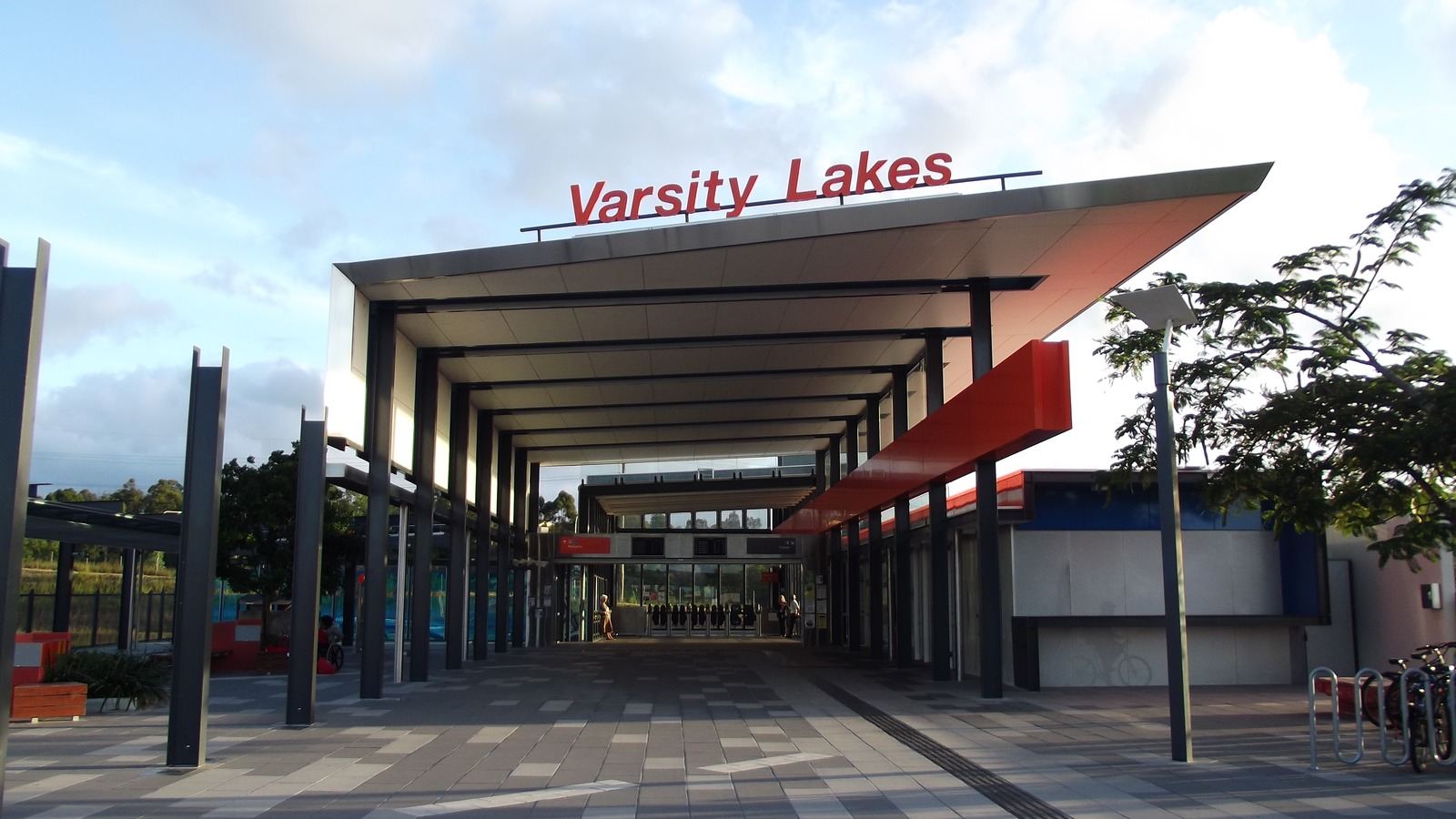 Varsity Lakes railway station entrance on the Gold Coast, Queensland, with the station name on the canopy