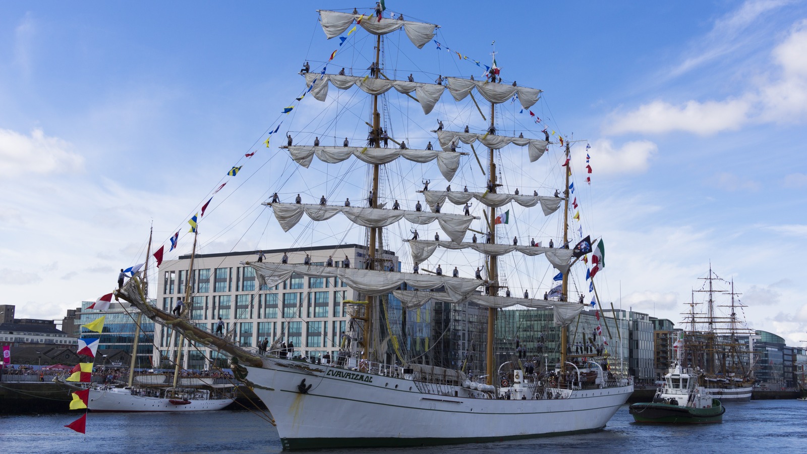 Mexican Navy training ship ARM Cuauhtemoc with cadets stationed in the yards and the ship's name on the bow