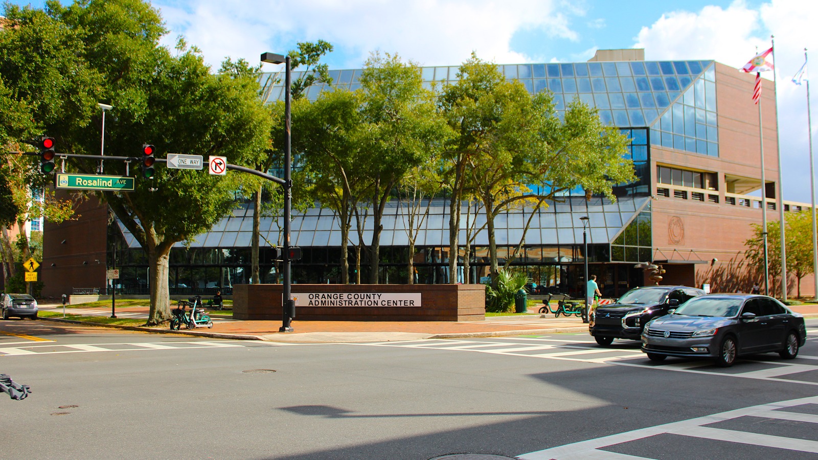Orange County Administration Center building on Rosalind Avenue in downtown Orlando with the county sign in front