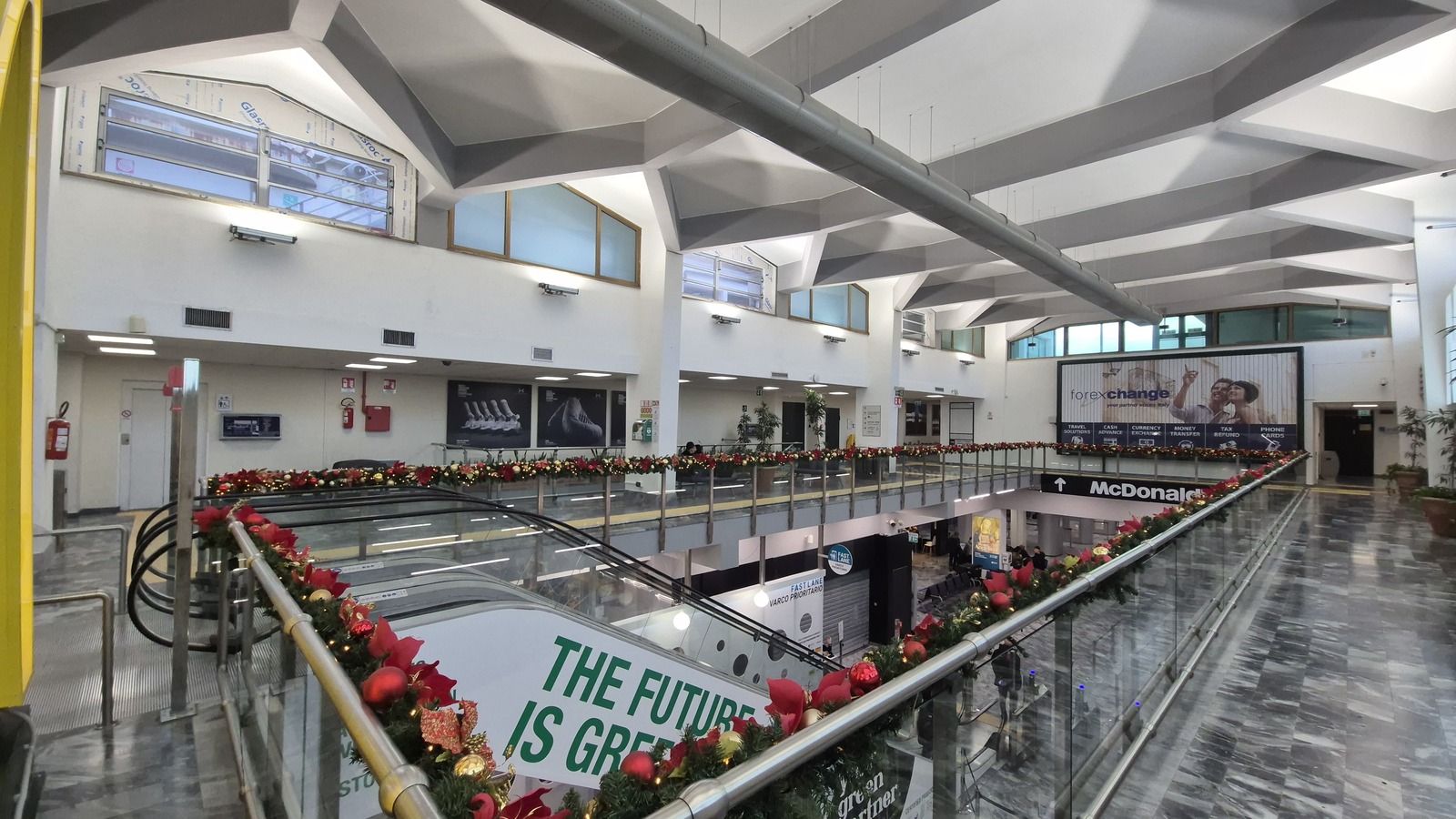 Archive December 2025 view of Pisa Airport upper-floor terminal interior, not the September 2026 strike
