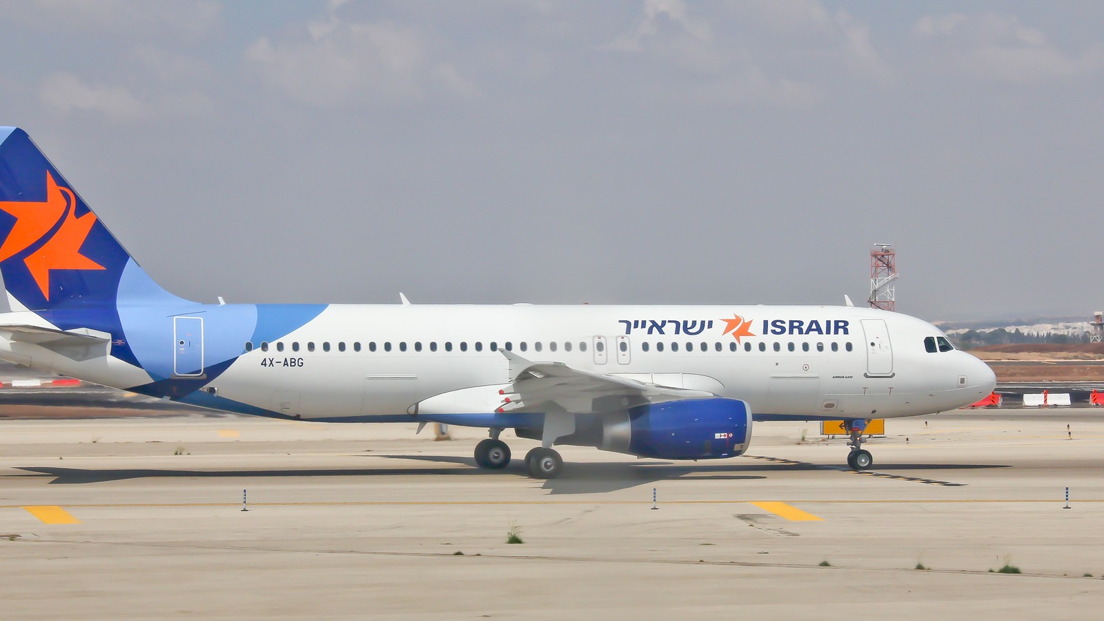 Israir Airbus A320 with ISRAIR titles taxiing on the tarmac at Tel Aviv Ben Gurion Airport