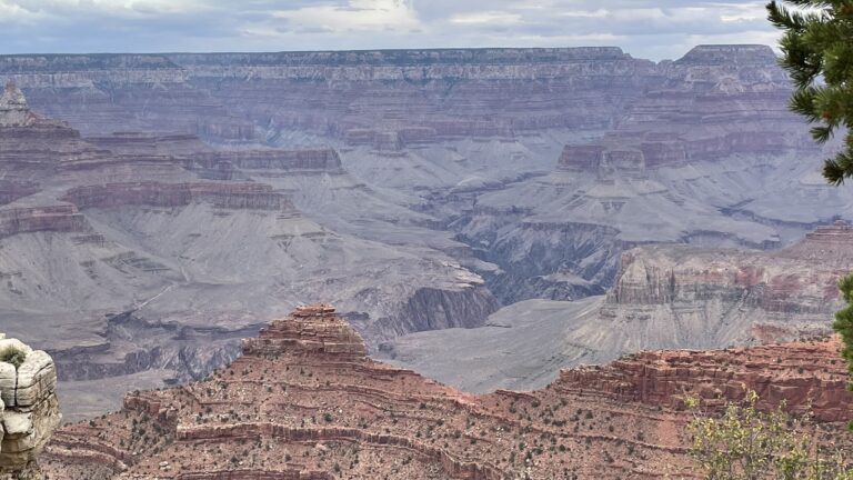 Grand Canyon from the South Rim near Mather Point, with layered canyon walls under a cloudy sky