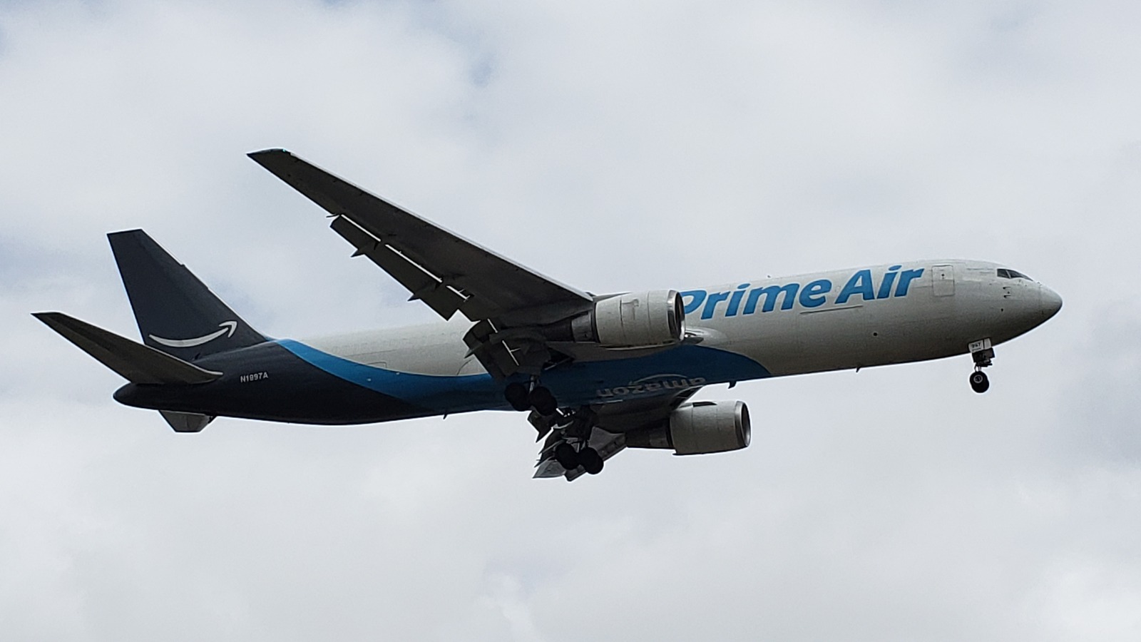 An Amazon Prime Air Boeing 767-300F cargo jet on final approach to Miami International Airport