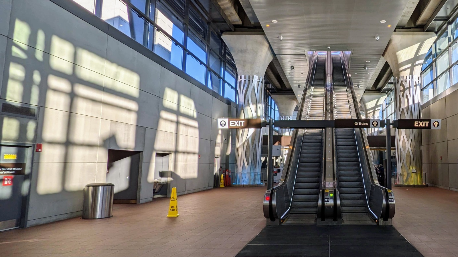 Escalators inside Dulles Airport Metro station, photographed in November 2022
