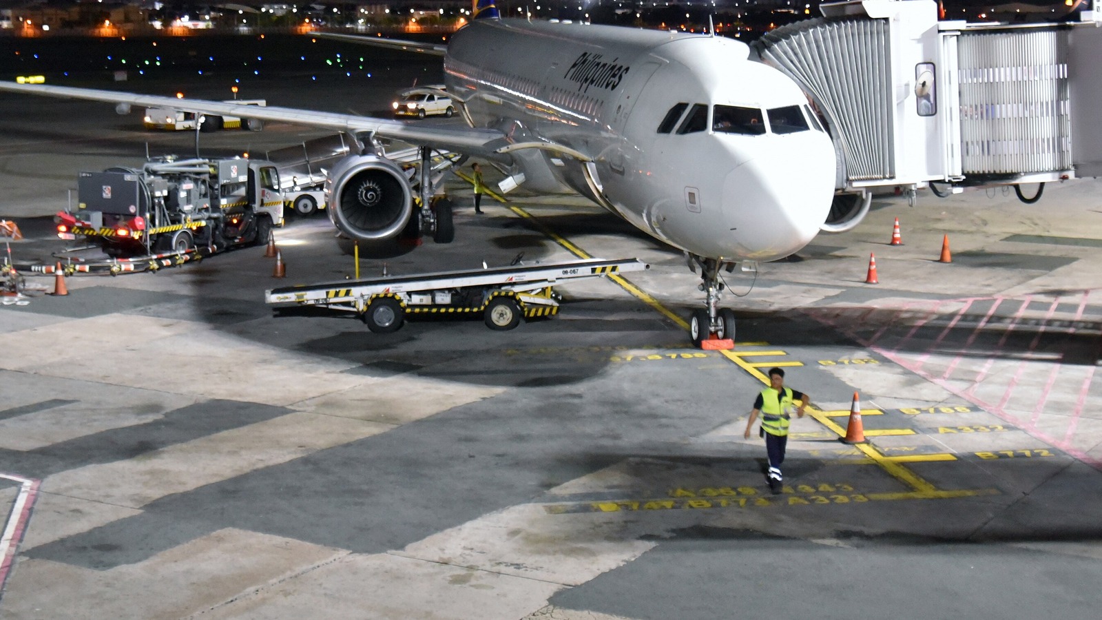 A Philippine Airlines Airbus A321 on the ground at Manila with the carrier's titles and sunburst tail visible.