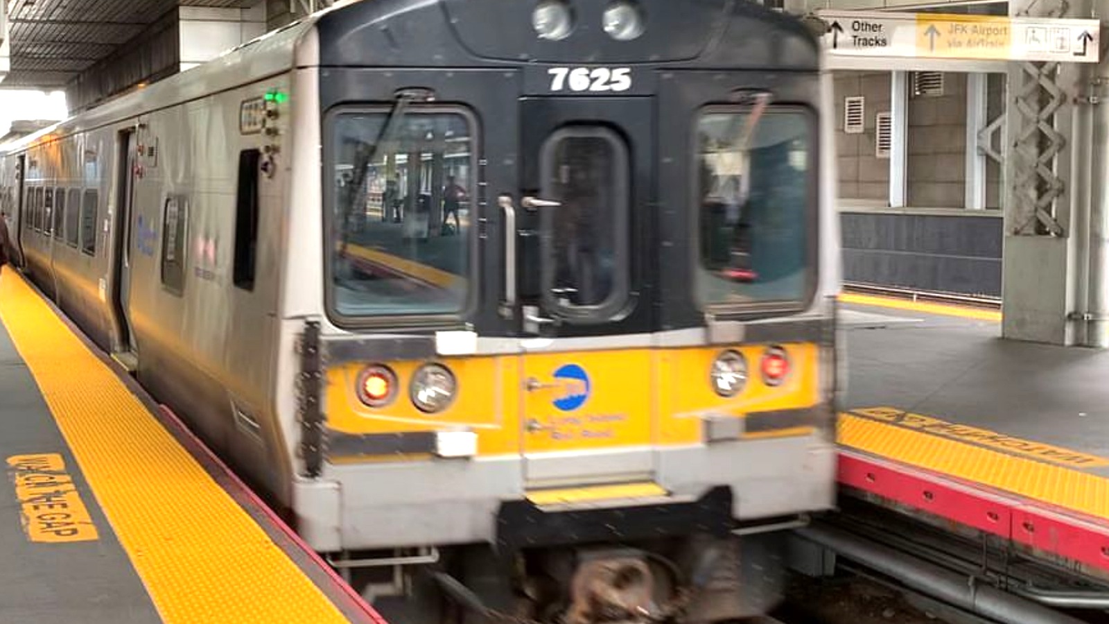 Long Island Rail Road M7 train number 7625 arriving at Jamaica station in daylight