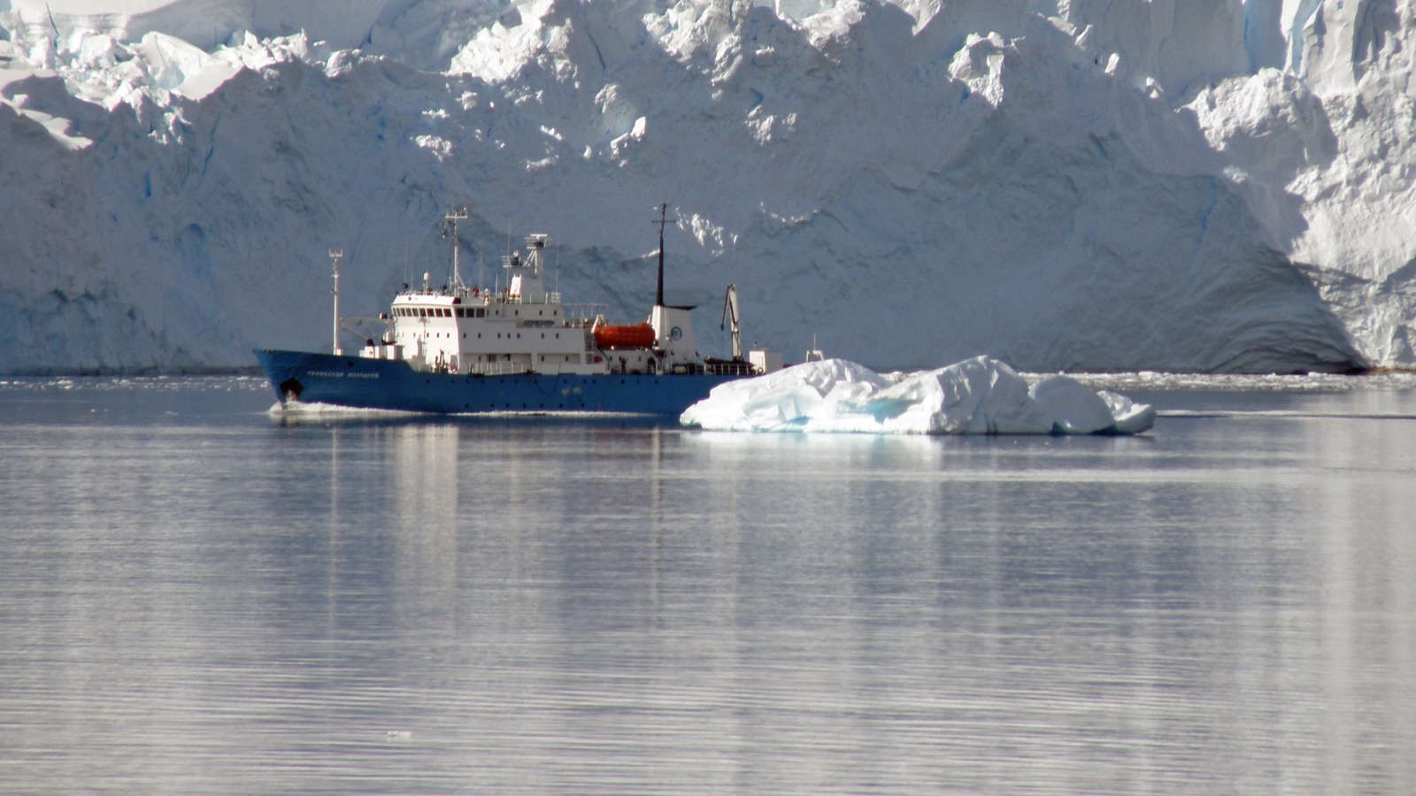 Professor Molchanov expedition ship near a glacier in an archival photograph