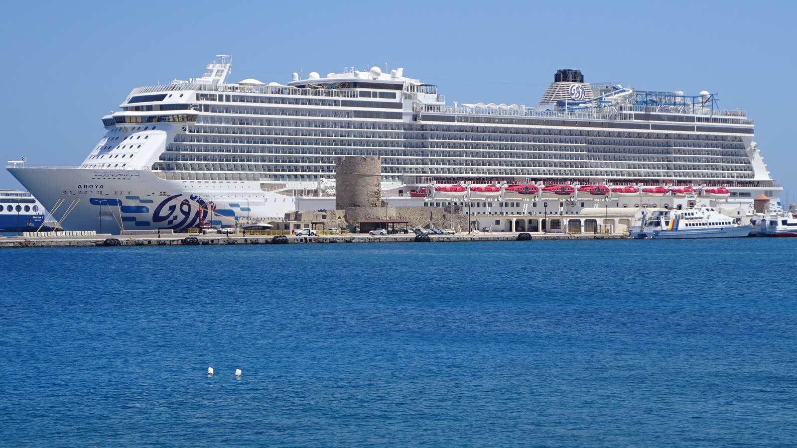 The AROYA cruise ship moored at the quay in the Port of Rhodes in July 2025