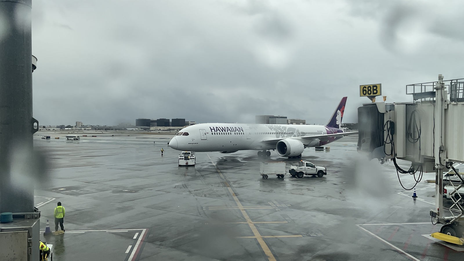 Hawaiian Airlines Boeing 787 at an airport gate in April 2025