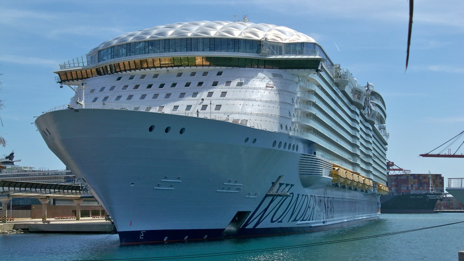 Royal Caribbean Wonder of the Seas docked bow-on at a sunny port