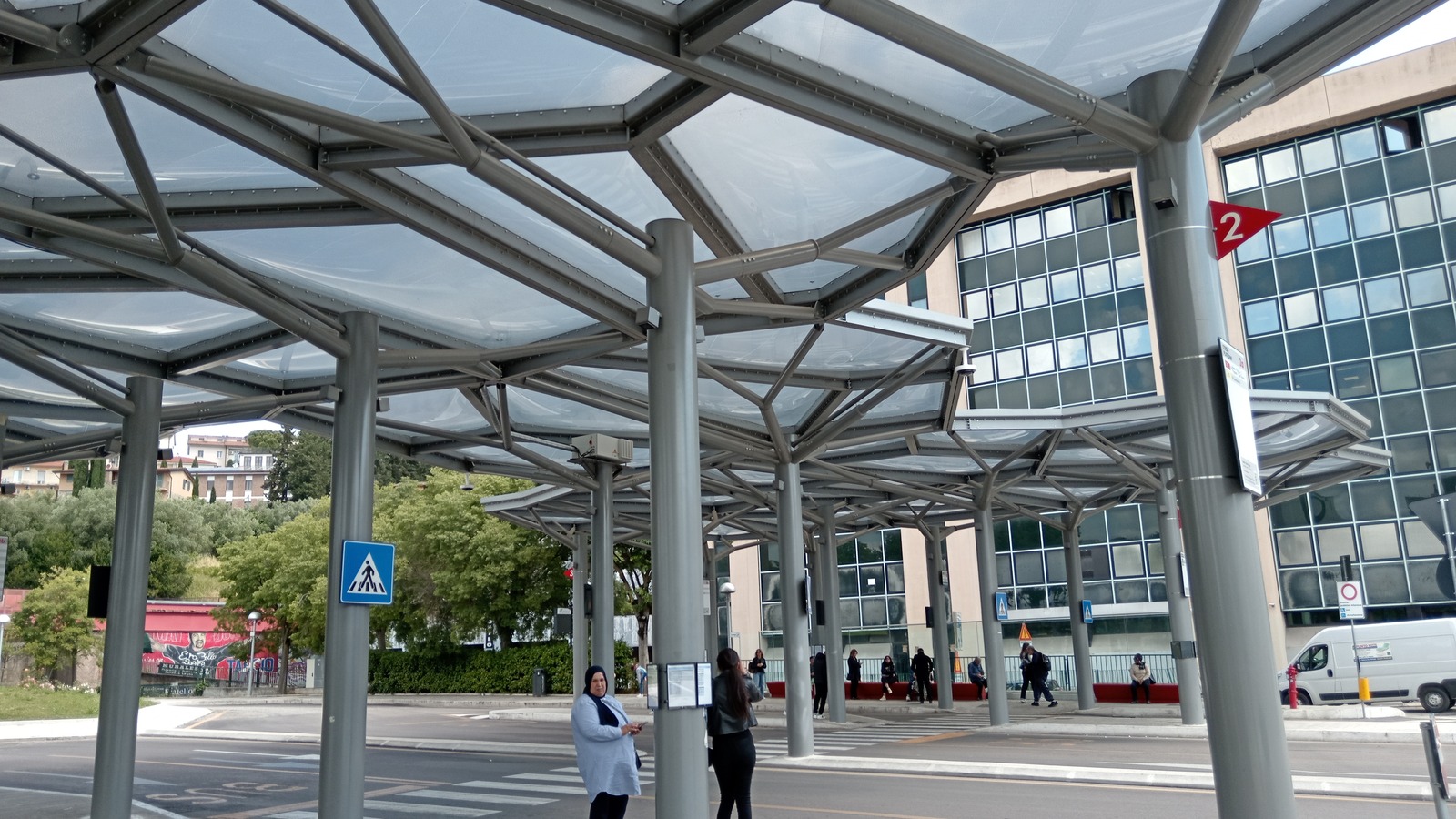 Daylight canopy and boarding lanes at Perugia bus station, the Busitalia terminal for Assisi and extraurban Umbria routes