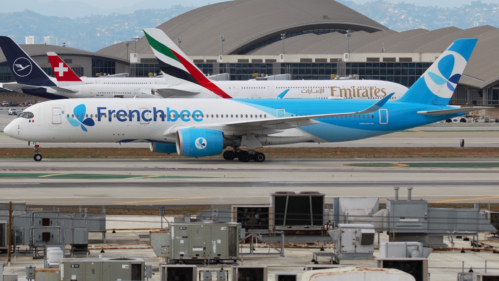 A French bee Airbus A350-900 taxiing at Los Angeles International Airport with the Frenchbee titles across the forward fuselage.