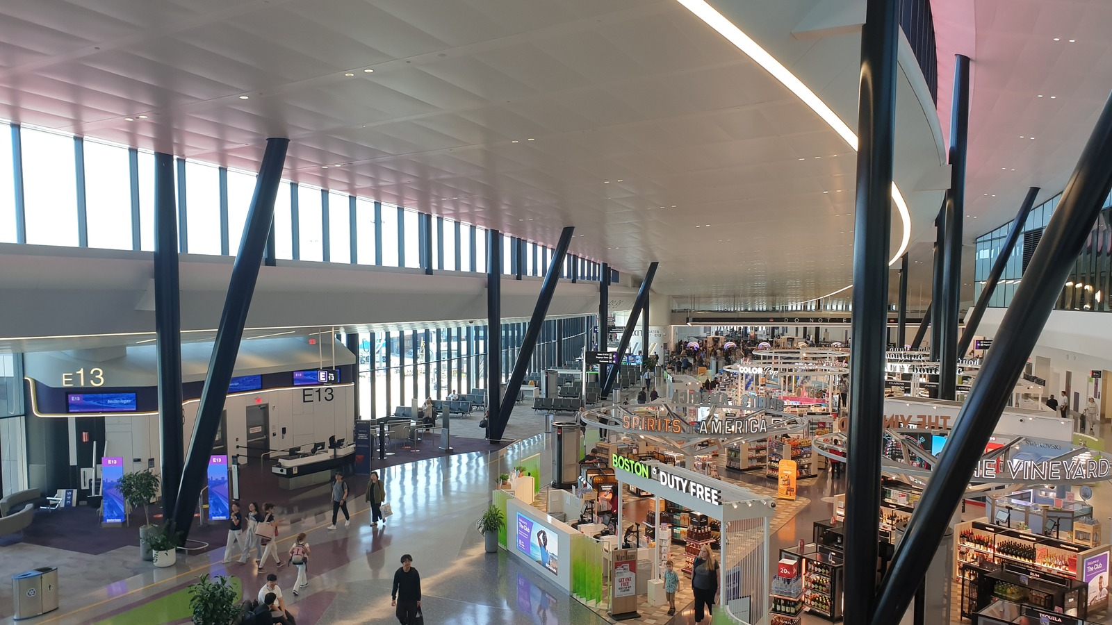 Interior of Terminal E at Boston Logan International Airport, with gate E13 and Boston Duty Free visible