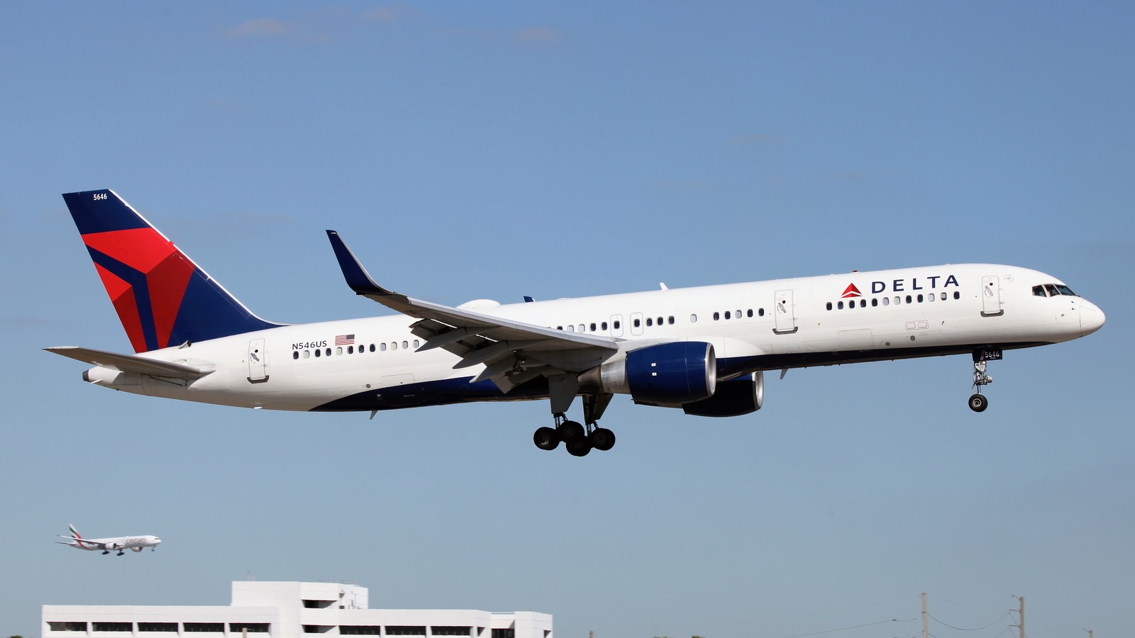 A Delta Air Lines Boeing 757-200 in Delta livery with red-and-blue tail, gear down on approach.