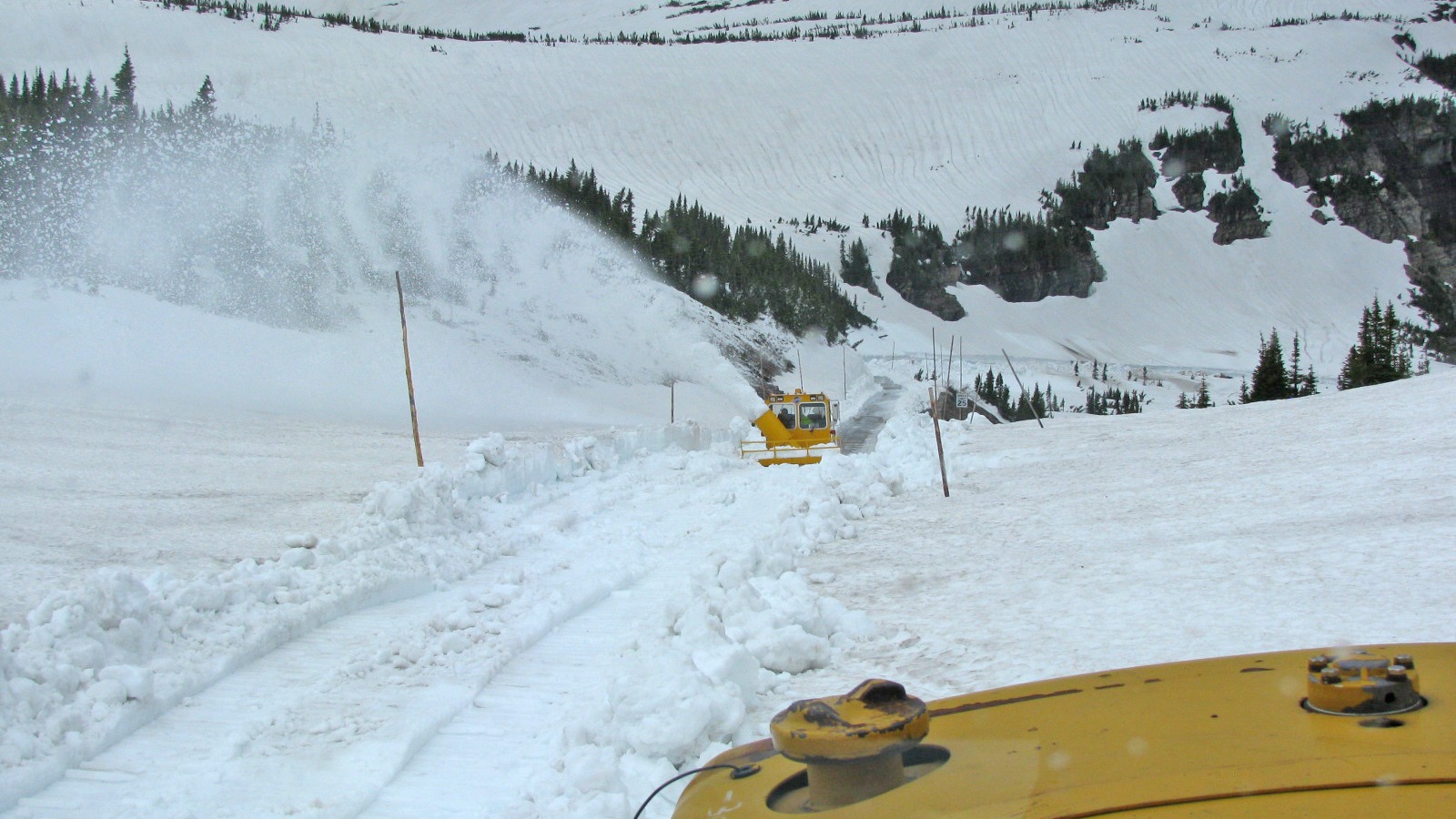 Snowplow clearing Going-to-the-Sun Road at Logan Pass in Glacier National Park