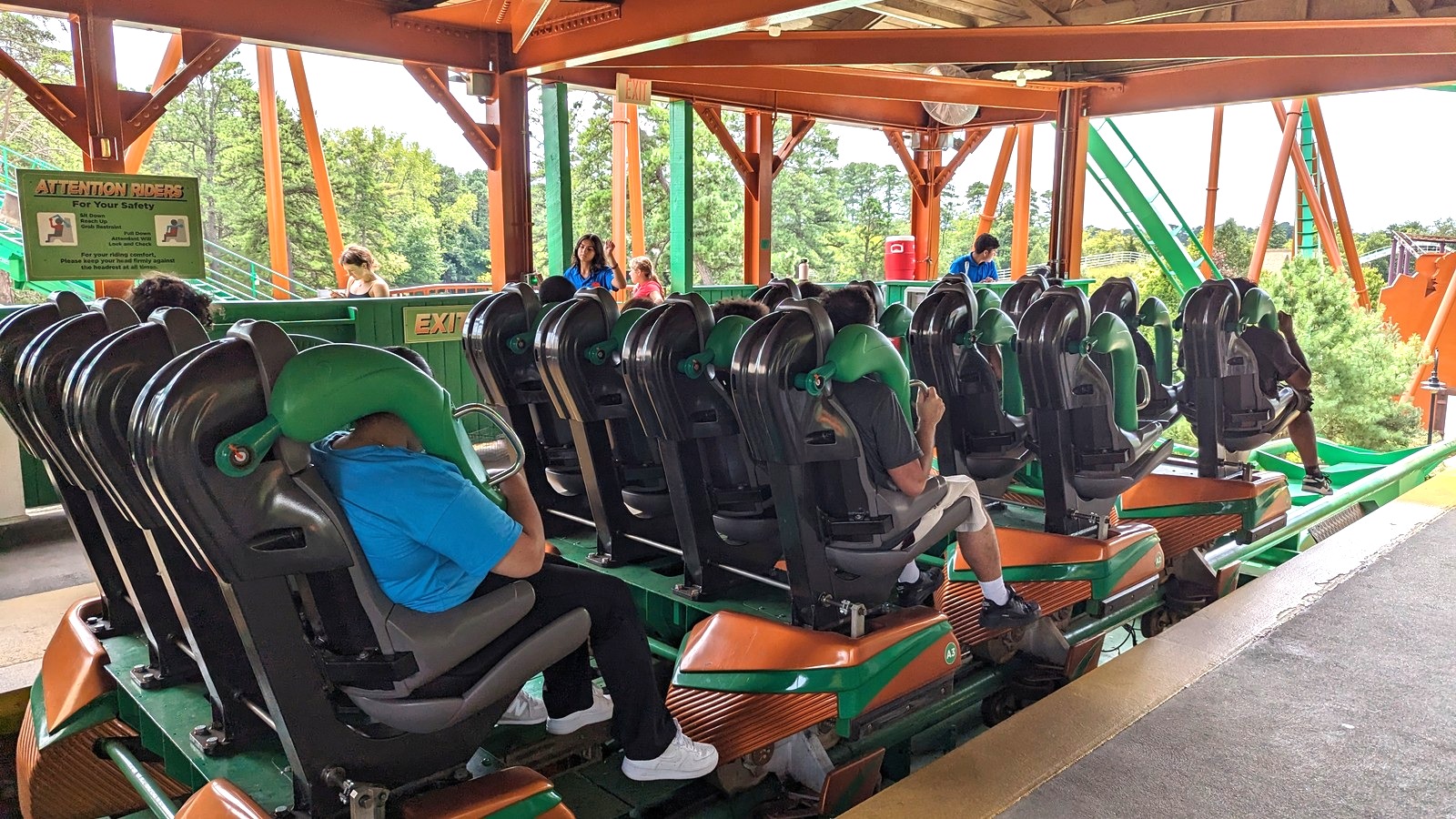 Medusa coaster train with riders in its station at Six Flags Great Adventure