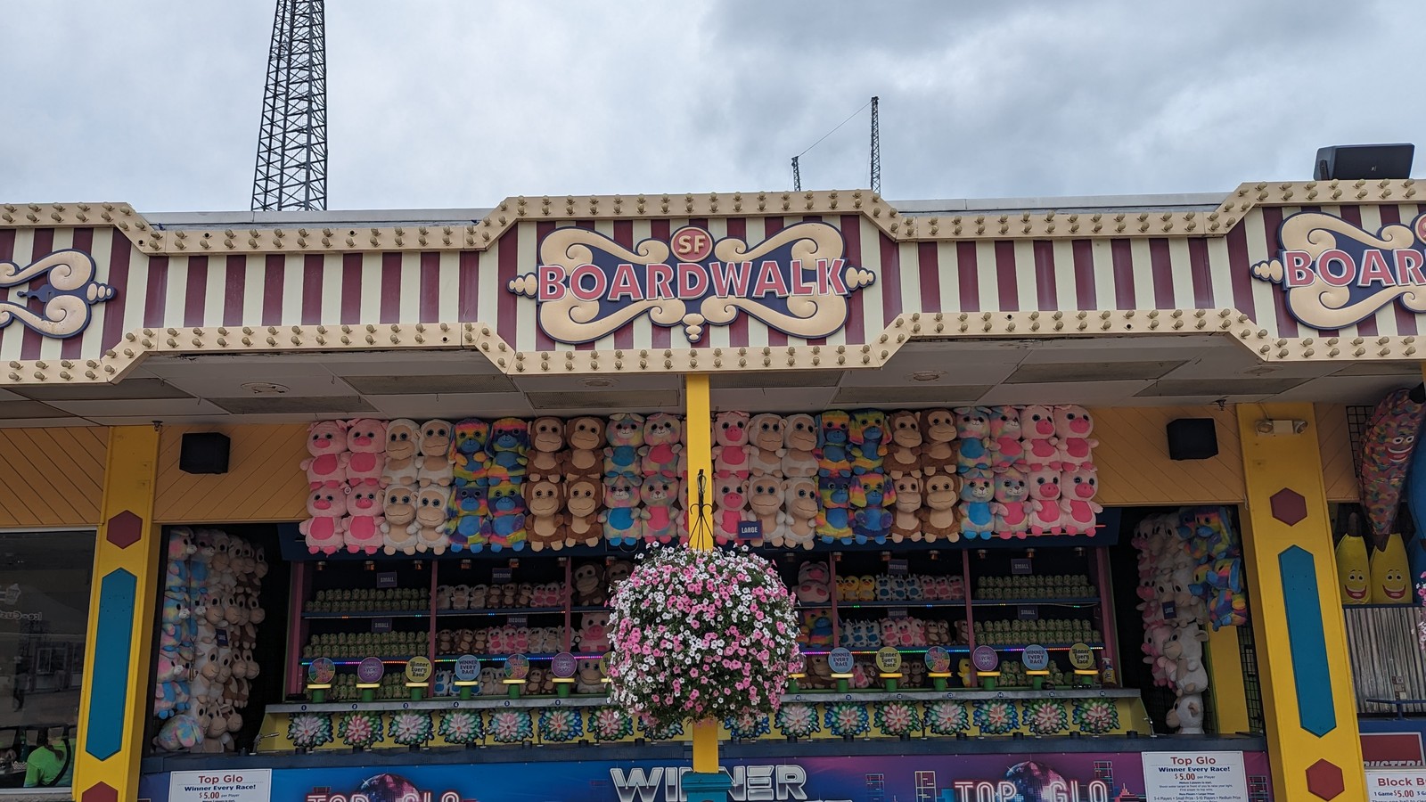 Boardwalk game booth and prize displays at Six Flags Great Adventure