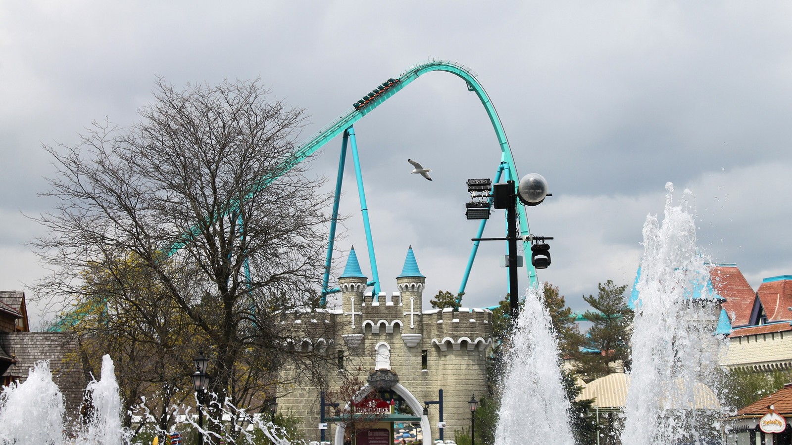 Leviathan coaster train above the International Street fountains at Canada's Wonderland